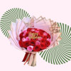 Bouquet of red and pink roses with butterfly decorations