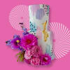 Pink floral arrangement beside a painted two-tier cake