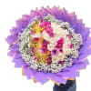 Round bouquet of pink and white roses with purple wrapping and butterfly picks