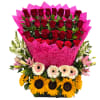 Bouquet of red roses with pink wrapping and sunflowers at the base