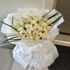 Bouquet of white callas with the addition of white roses