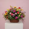 Mixed flower basket with roses, lilies, and daisies