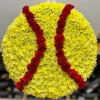 Round yellow floral standing spray shaped like a softball with red stitching lines