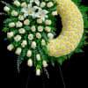 Standing crescent spray of white roses, lilies, and pale yellow chrysanthemums on an easel