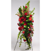 Tall red floral standing arrangement with roses and gerbera daisies