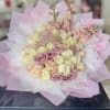36 pink,white,peach and lavender roses.
