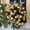 A graceful and heartfelt tribute, this stunning standing spray is designed to