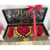 Heart-shaped rose gift box with chocolates and a Valentine’s Day message
