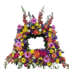 Large floral wreath with a central opening and multicolored blooms