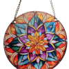 Round stained-glass-style hanging panel with a colorful floral mandala design