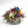 Delight someone special with our "A Spot of Tea" fresh floral arrangements