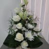 A nice basket with white flowers 