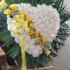 This is a funeral or sympathy standing heart spray,  It&rsquo;s designed