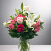 
A beautiful mix of soft pink roses, white lilies, and vibrant alstroemeria