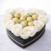 A stunning heart-shaped arrangement featuring premium white roses paired with Ferrero Rocher