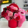 Our sweet arrangement with a pink sleeping teddy bear 