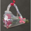 Hot pink roses,white poms and greenery tide With a pink ribbon in