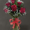 Dozen red roses, greenery and baby&rsquo;s breath 