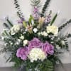 Large floral standing spray with pink and white roses and lilies