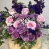 Bouquet of pink and purple roses with lavender chrysanthemums