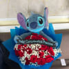 arreglo elaborado con mu&ntilde;eco de stitch con banda personalizada