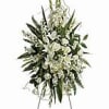Tall white floral standing spray on an easel
