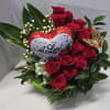 Red roses with a heart-shaped "I Love You" balloon