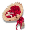 Bouquet of red roses wrapped in beige paper with a red ribbon