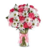 Bouquet of pink carnations and white daisies in a clear glass vase