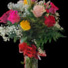 Mixed rose bouquet in a clear glass vase with a red ribbon