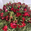 Large red floral spray with roses and gerbera daisies