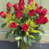 Long stems red roses with solidigo in a vase 