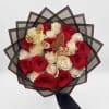 Bouquet of red and white roses with butterfly decorations