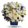 Blue Life arrangement comes in a glass blue cube, includes white lilies