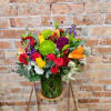 Colorful mixed bouquet in a clear glass vase