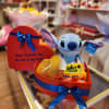 Heart-shaped gift box with candy and a Stitch plush toy