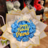 Blue rose bouquet with a gold birthday topper and crown