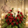 A dignified tribute, this arrangement is adorned with a lush bed of