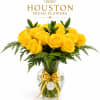 Sunlit yellow roses gathered in a compact, tightly layered cluster create an