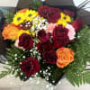 Bouquet of red and orange roses with yellow daisies and white baby's breath