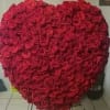 Large heart-shaped arrangement of red roses