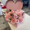 Pink rose and carnation arrangement in a heart-shaped box