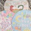 Baby shower balloons with dinosaur, ABC, and "It's a Boy" designs