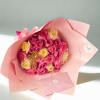 Beautiful pink roses and some cream roses with a bouquet  