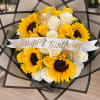 Bouquet of yellow sunflowers and white roses with a Happy Birthday ribbon