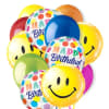 Cluster of colorful birthday balloons with smiley faces and "Happy Birthday" text