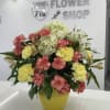 A fresh, uplifting energy of the yellow and white blooms in the