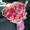 Bouquet of red and pink roses with carnations and eucalyptus
