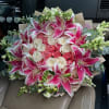Bouquet of pink and white roses with pink lilies