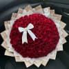 Large bouquet of red roses with a white ribbon bow